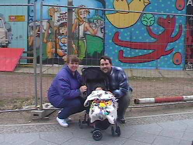 The family in front of the Berlin Wall!